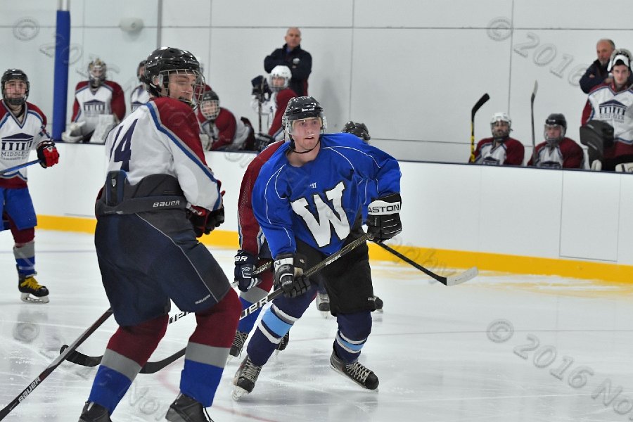 Wheaton College Men\'s Ice Hockey vs Middlesex Community College. - Photo By: KEITH NORDSTROM